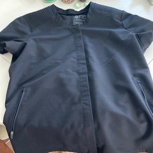 Womens black limbe figs scrub top